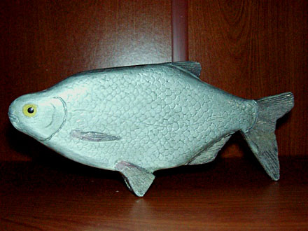 carved wood fish